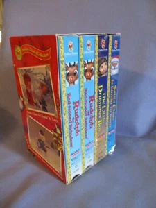 M-131-Christmas Movies set of 4-Santa Clause is comin to Town - Picture 1 of 4