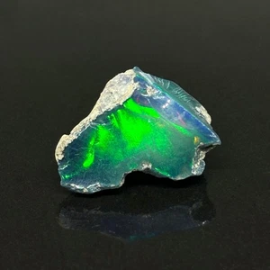 Black Rough Welo Ethiopian Varnish Flash Opal Stone - Picture 1 of 6