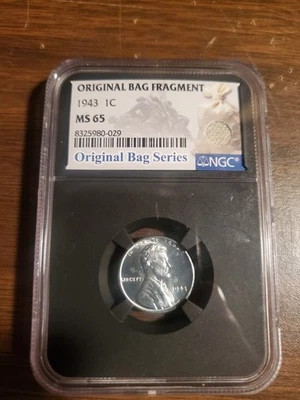 1943 1c Lincoln Steel Wheat Cent NGC Graded MS 65.  original bag fragment. - Image 1 of 2