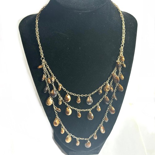 VETEMENTS Collana tre strati perle pendenti a goccia sfaccettate marrone ambra dorata