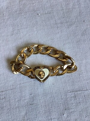 Pulsera de eslabones Cahin tono dorado corazón estrás esmalte blanco Guess para mujer Foto 1 de 4