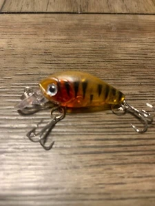 Micro Crankbait 1 1/2 pulgada naranja con rayas rojas negras - Imagen 1 de 3