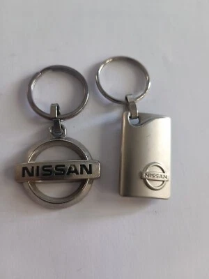 2 Porte-clés Automobile NISSAN Garage Keychain vintage 80' - Photo 1/2