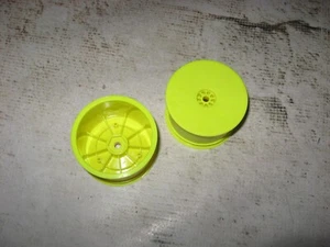 RC Racing AKA Hexlite 2WD Buggy Rear Wheels Plastic Yellow (2) 23101 Y - Picture 1 of 2