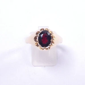 Garnet Solitaire ring 9 carat yellow gold size W claw set oval garnet - Picture 1 of 6
