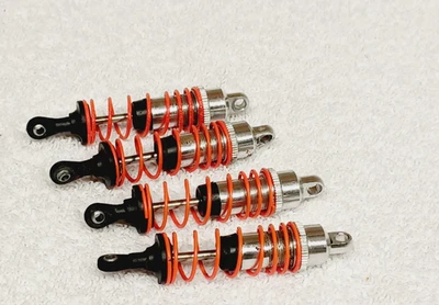 AMORTECEDORES DE ALUMÍNIO VINTAGE DURATRAX MAXIM BX RC 1/10 NITRO BUGGY ORIGINAL DE FÁBRICA - Imagem 1 de 3