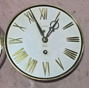 Orologio da parete Syroco Clockworks SOLO gioiello sconosciuto funzionante solo parti - Foto 1 di 10