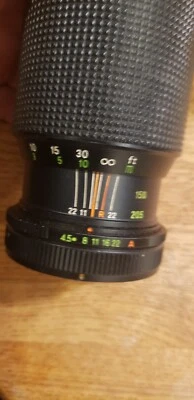 Canon-compatible camera lens M.C. Macro Zoom 1:4.5 F= 80-205mm GREAT SHAPE - Image 1 of 3