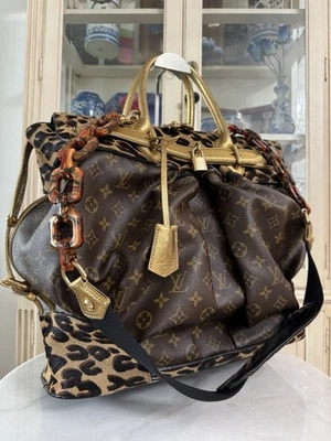 Louis Vuitton Sprouse Monograma Vapor Equipaje Piel de Serpiente Bolso de Lona $7,900 Foto 1 de 4