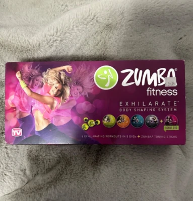 ZUMBA Fitness Exhilarate Body Shaping System NEW UNOPENED (Includes DVDS & stick - Image 1 of 3