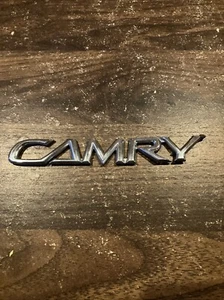 OEM 2002-2006 Toyota Camry Trunk Lid Emblem Badge SYMBOL LOGO - Picture 1 of 3