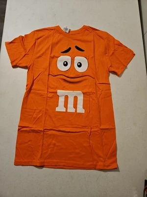 Camiseta gráfica cara de personaje Candy Silly de M&M's para amantes de los dulces (A995) Foto 1 de 4