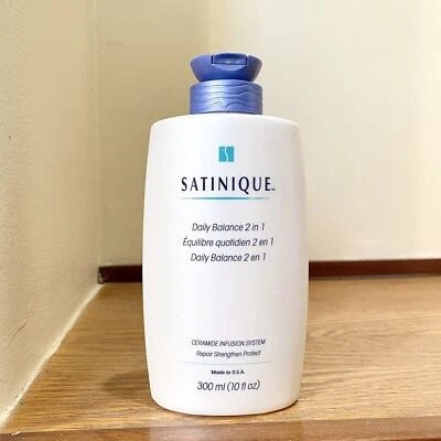 Champú acondicionador 2 en 1 Amway Satinique de colección equilibrio diario reparación ceramida Foto 1 de 3