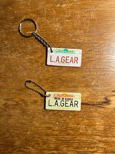(2) Vintage_L.A.GEAR_Keychains_CA License Plate The Golden State _rAd_cHECK iT_ - Picture 1 of 7