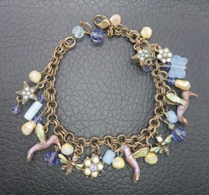 Pulsera Vintage KIRKS FOLLY Dije Colibrí Estrellas Abejas Colores Púrpura - Imagen 1 de 5