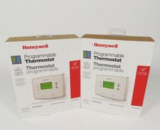 PAIR OF HONEYWELL PROGRAMMABLE THERMOSTAT RTH2300B