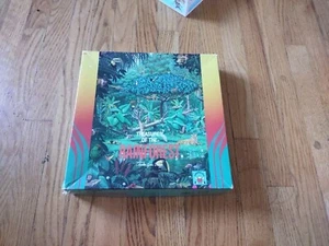 Puzzle THE TREASURES OF THE RAINFOREST 300 Pieces 20” X 27.” Discovery Toys 1991 - Picture 1 of 3