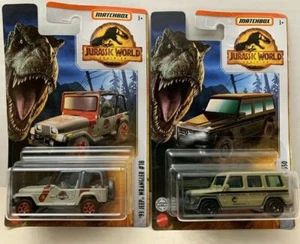 2 matchbox cars , (Jurassic World) , 93 Jeep Wrangler, 14 Mercedes-Benz G 550 - Picture 1 of 1