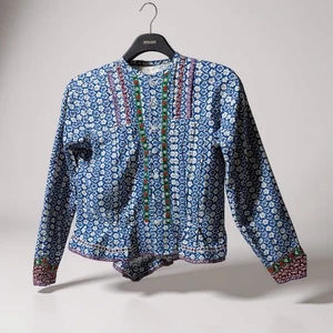 Blusa campesina vintage azul floral bordada manga larga dobladillo con volantes - Imagen 1 de 7
