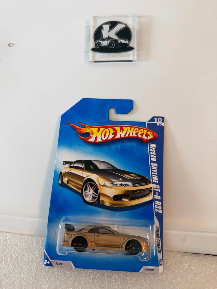Nissan Skyline R32 GT-R 2009 Dream Garage Hot Wheels en oro oscuro con negro A30 Foto 1 de 1