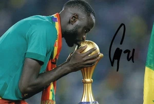 IVORY COAST & NOTTINGHAM FOREST: CHEIKHOU KOUYATE SIGNED 6x4 TROPHY PHOTO+COA - Picture 1 of 1