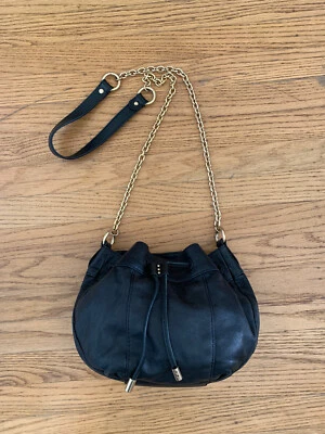 Juicy Couture black leather gold-tone chain drawstring bag cross-body bag - Image 1 of 4