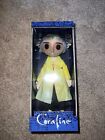NECA Laika CORALINE Doll Button Eyes Prop Replica Yellow Raincoat 10" Figure