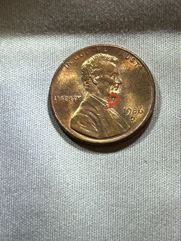 1986 D Penny with errors.  Wide AM Cover