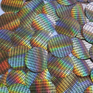 Impresión de código técnico binario Lazersheen redondo de lentejuelas de 1,5" oro negro - Imagen 1 de 2