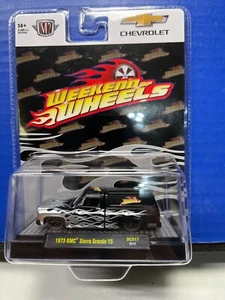 1/64 M2 WEEKEND OF WHEELS 1973 GMC SIERRA GRANDE 15 BLACK W/GRAY FLAMES - Picture 1 of 2
