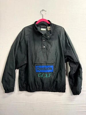 Chaqueta cortavientos de golf Reebok de colección para hombre mediana negra bolsillos deletreados pulóver Foto 1 de 4