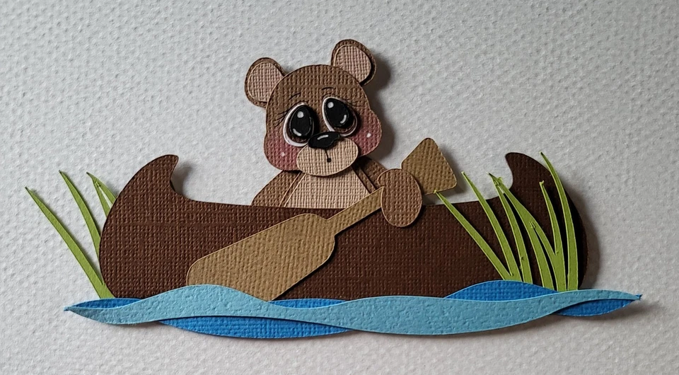 Oso kayak. Álbum de recortes, piezas de papel para hacer tarjetas Foto 1 de 1