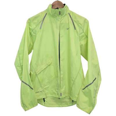 Chaqueta cortavientos Nike Storm-Fit para correr ciclismo amarilla para mujer pequeña Foto 1 de 4