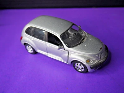 2000 New Ray Chrysler PT Cruiser, Doors Open, Silver, 1/32 - Image 1 of 4