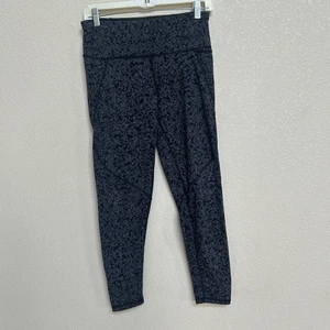 Legging ajustado Sweaty Betty The Power para mujer pequeño negro floral 7/8 - Imagen 1 de 6