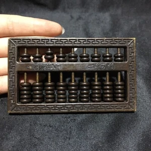 Artículos antiguos de bronce, cuidadosamente calculados con un pequeño ábaco. - Imagen 1 de 5