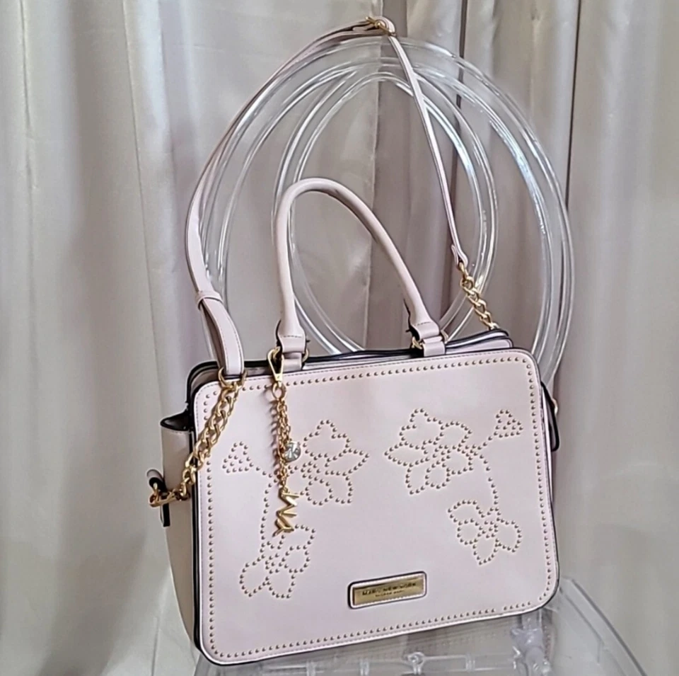 Cartera Marc New York Andrew Marc rosa para aprender  Foto 1 de 4