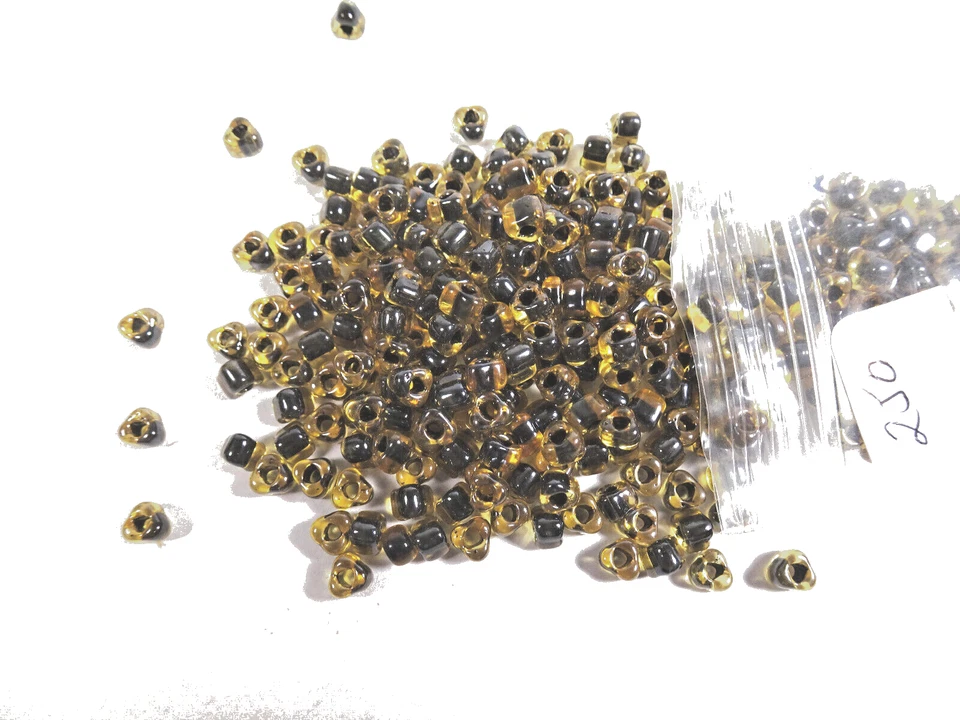 125 Miyuki Transparent Color-Lined Amber & Dark Brown Glass TRIANGLE BEADS - Image 1 of 1