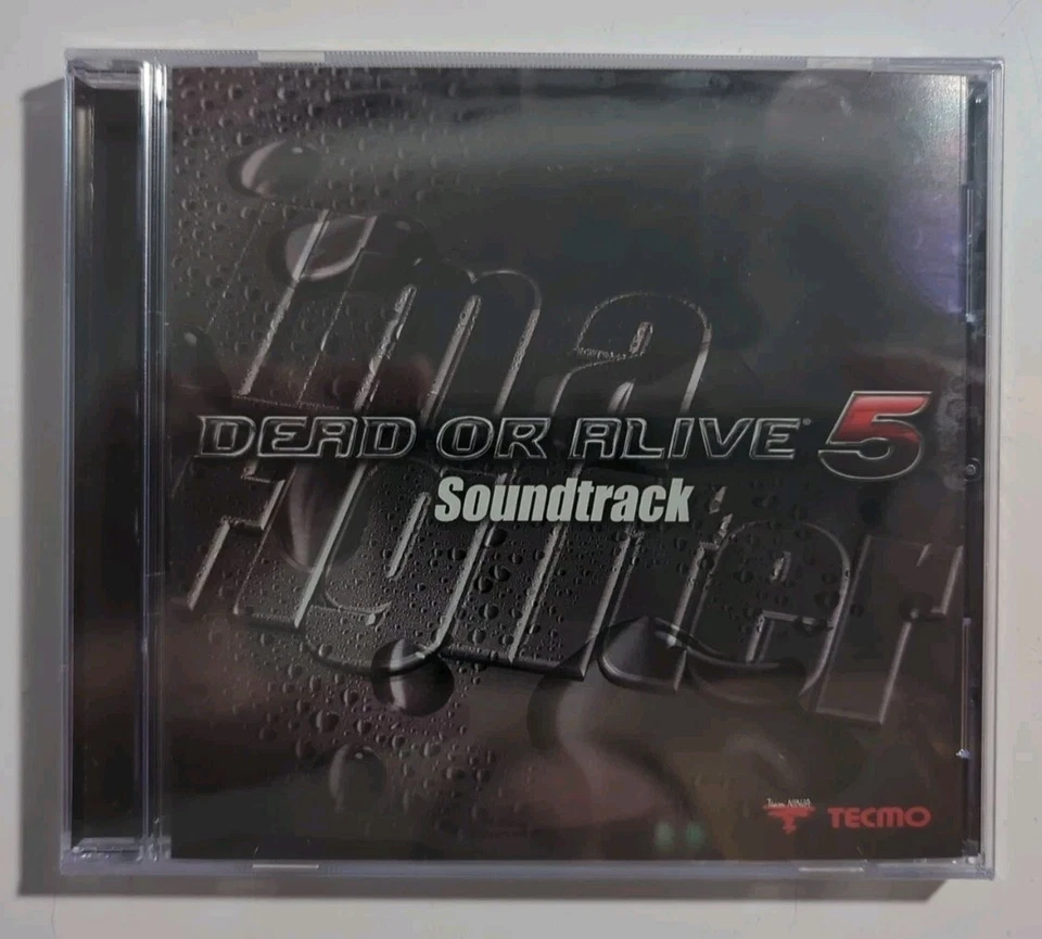 Dead Or Alive 5 - Banda sonora - Sellado Foto 1 de 3
