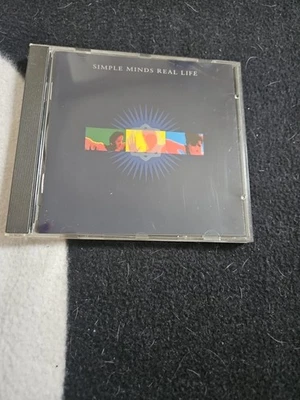Simple Minds CD - Real Life - Bild 1 von 4