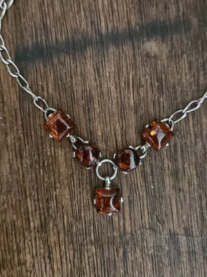 Juego de aretes y collar perforados de ámbar natural en plata de ley Foto 1 de 4