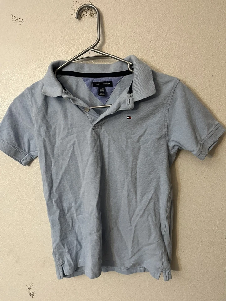 Camisa polo Tommy Hilfiger azul lisa para adolescentes talla mediana Foto 1 de 3