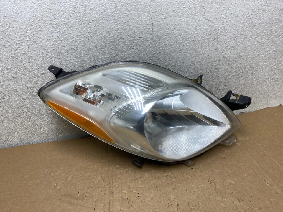 Faro halógeno pasajero derecho Toyota Yaris 2006-2008 hatchback OEM U9923 DW Foto 1 de 4