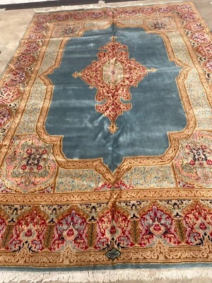 Alfombra de lana tejida a mano con diseño de medallón Foto 1 de 4