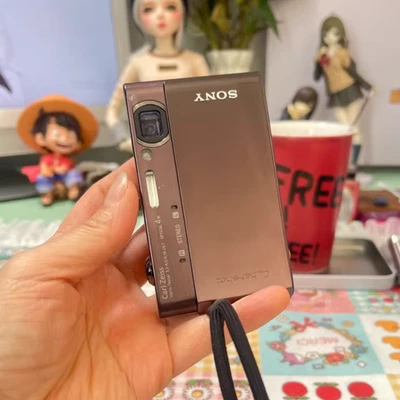 Sony DSC-T900 CyberShot Digital Camera 12.1MP CCD Camera  English - Brown - Image 1 of 4