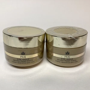 2X PRAI 24K GOLD Wrinkle Repair Creme 0.5 oz each (1 oz total) NOS Sealed - Picture 1 of 6