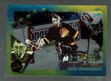1994-95. Score Gold Line.  Punched.    Kirk McLean.      #60