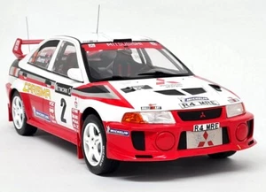 Modellino auto da corsa iXO 1/18 Mitsubishi Lancer RS Evo V RAC Rally 1998 Burns Reid #2 - Foto 1 di 8