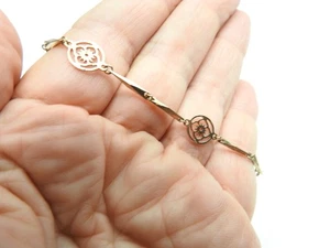 Signed Avon Gold Tone Metal Flower Cut Out Disc Linked Bracelet Vintage - Picture 1 of 3