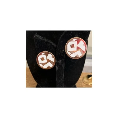 Pendientes de clip vintage Avon tono dorado y esmalte blanco Foto 1 de 3